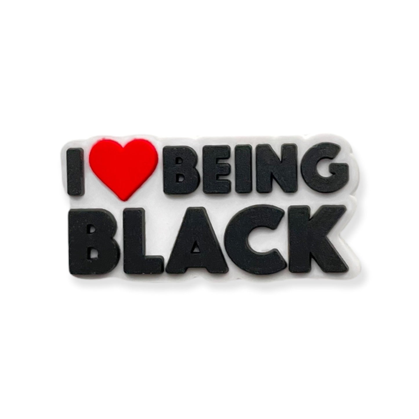 I love being black 1 inch croc shoe charm in the colors white, black, and red.